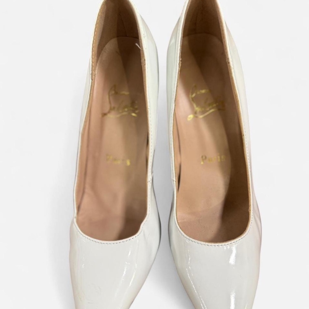 Elegant White Heels with Red Bottoms